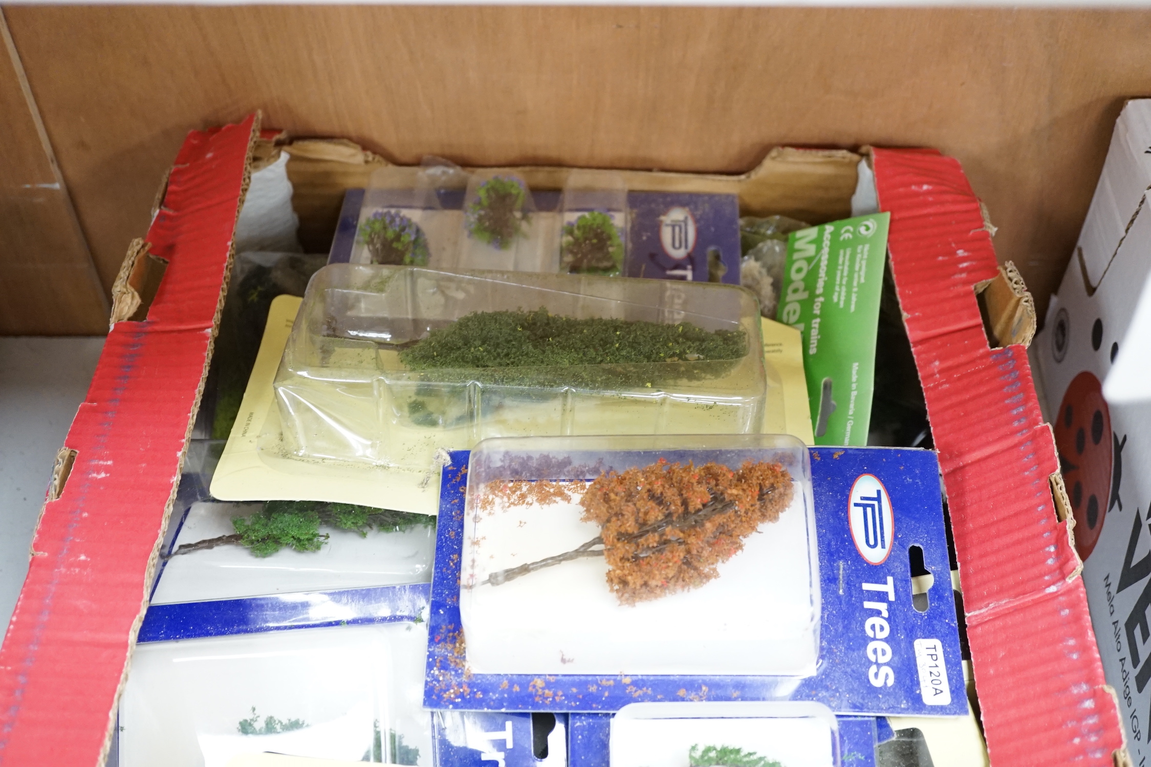 A collection of unmade, 4mm scale 00 gauge model, railway kits, and lineside accessories, including freight wagons, four-wheel coaches, commercial vehicles, etc. by Dapol, Cooper Craft, Parkside Dundas, etc. together wit